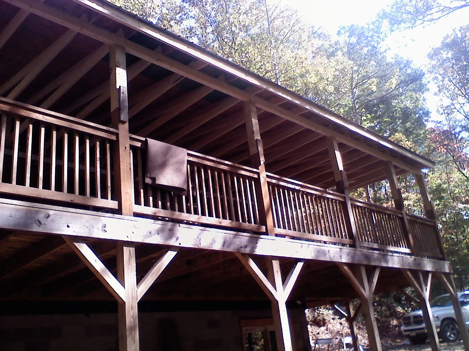 Timber framing under a new elevated porch and deck — Roof Leak Repair in Antwerp by Roofing Brothers